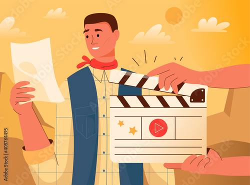 Movie making. Actor reads script. Hands holding clapperboard