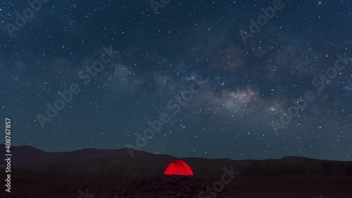 Red tent under Milky Way Galaxy Time Lapse Lampang Thailand, Universe galaxy milky way time lapse, dark milky way, galaxy view, star lines, timelapse night sky stars on sky background. 4K Resolution.