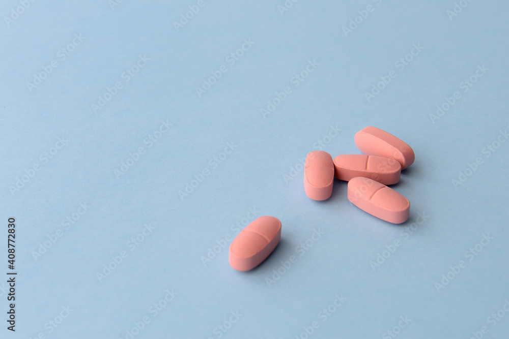 Pharmaceutical medicine pills over blue background Pharmaceutical medicine pills over blue background