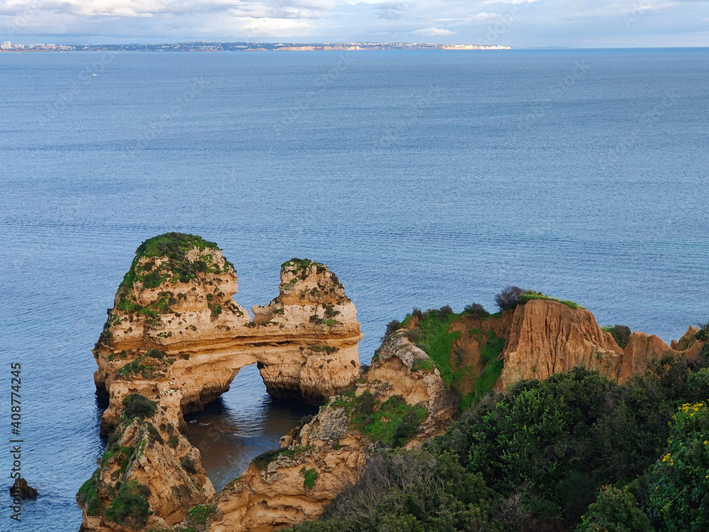 Beautiful stretches of coastline at Lagos, Algarve, Portugal, with cliffs, sand and sea