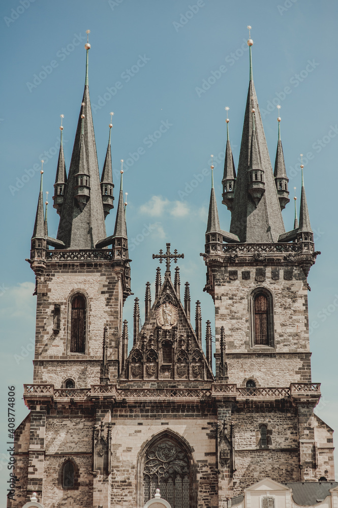 PRAGUE, CZECH REPUBLIC - July 28, 2013: Church of our lady of tyn on blue sky background with clouds.