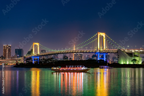 Rainbow bridge at twilight in Tokyo, Japan
