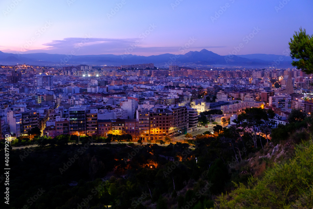 Sunset in alicante city, beautiful views from the santa barbara castle towards the neighborhoods