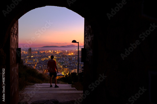 Sunset in alicante city, beautiful views from the santa barbara castle towards the neighborhoods photo