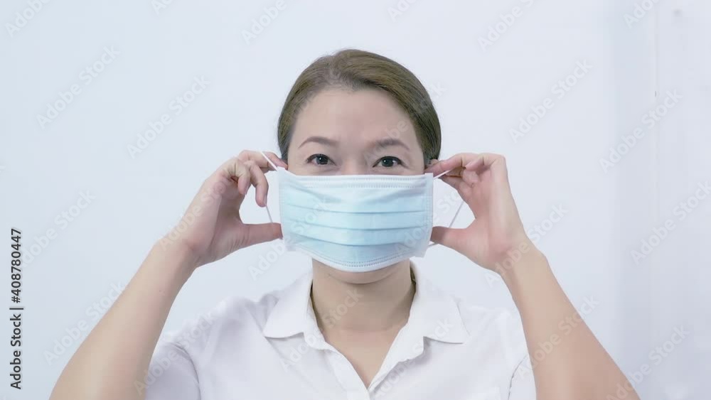 Asian women wearing medical masks to prevent bacteria in the air. Sanitation concepts prevent the spread of germs and bacteria and avoid coronavirus infection. Asian women wearing medical masks to prevent bacteria in the air. Sanitation concepts prevent the spread of germs and bacteria and avoid coronavirus infection.