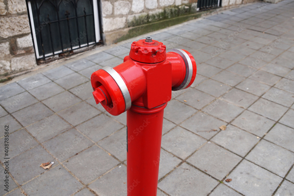 red fire hydrant on the sidewalk close-up red fire hydrant on the sidewalk close-up