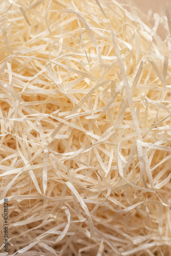 paper wrapping shavings for gifts in beige box