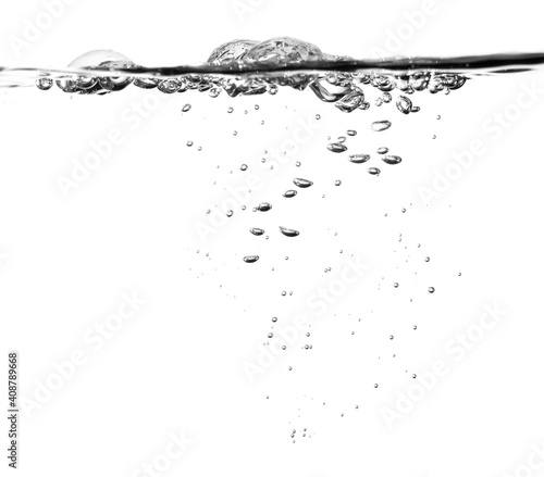 Bubble soda and black oxygen air, in underwater clear liquid with bubbles flowing up on the water surface, isolated on a white background. with copy space