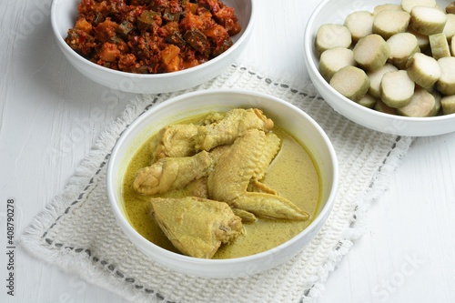 Opor ayam or chicken curry ,traditional Indonesian food ,is chicken cooked with coconut milk and spices, served to celebrate Eid al_Fitr or Lebaran.