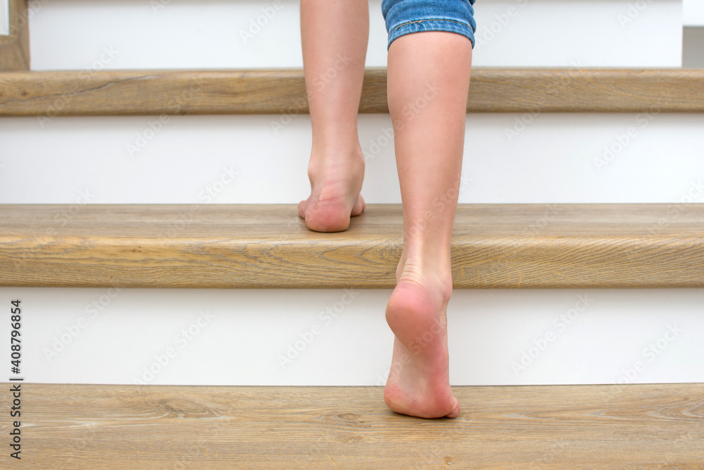 custom made wallpaper toronto digitalBarefoot legs of a child on wooden stairs. 