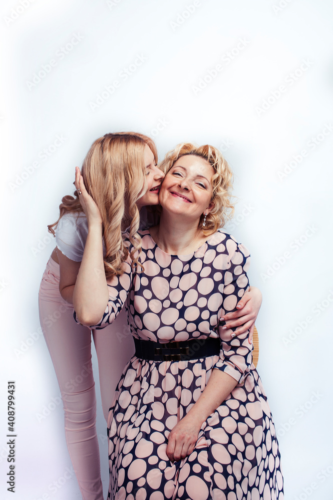mother with teen daughter together posing happy smiling isolated on white background with copyspace, lifestyle people concept mother with teen daughter together posing happy smiling isolated on white background with copyspace, lifestyle people concept