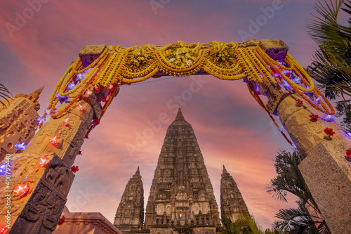 The stupa at Mahabodhi Temple Complex during sunset in Bodh Gaya, India.