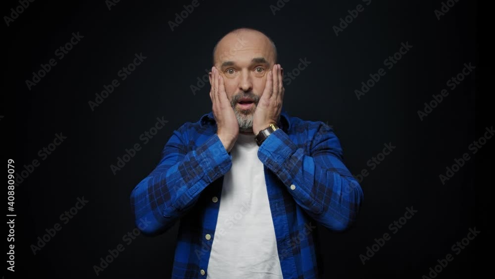 emotion, expression and people concept - shocked man over black background emotion, expression and people concept - shocked man over black background