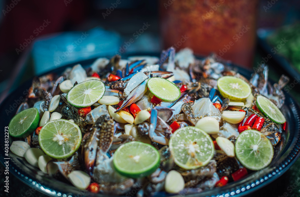 Fresh blue crab salad for sale on Walking Street, Chiang Khan District, Thailand. Fresh blue crab salad for sale on Walking Street, Chiang Khan District, Thailand.
