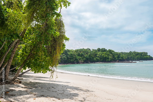 Manuel Antonio beatiful tropical beach with white sand and blue ocean. Paradise. National Park in Costa Rica, Central America.