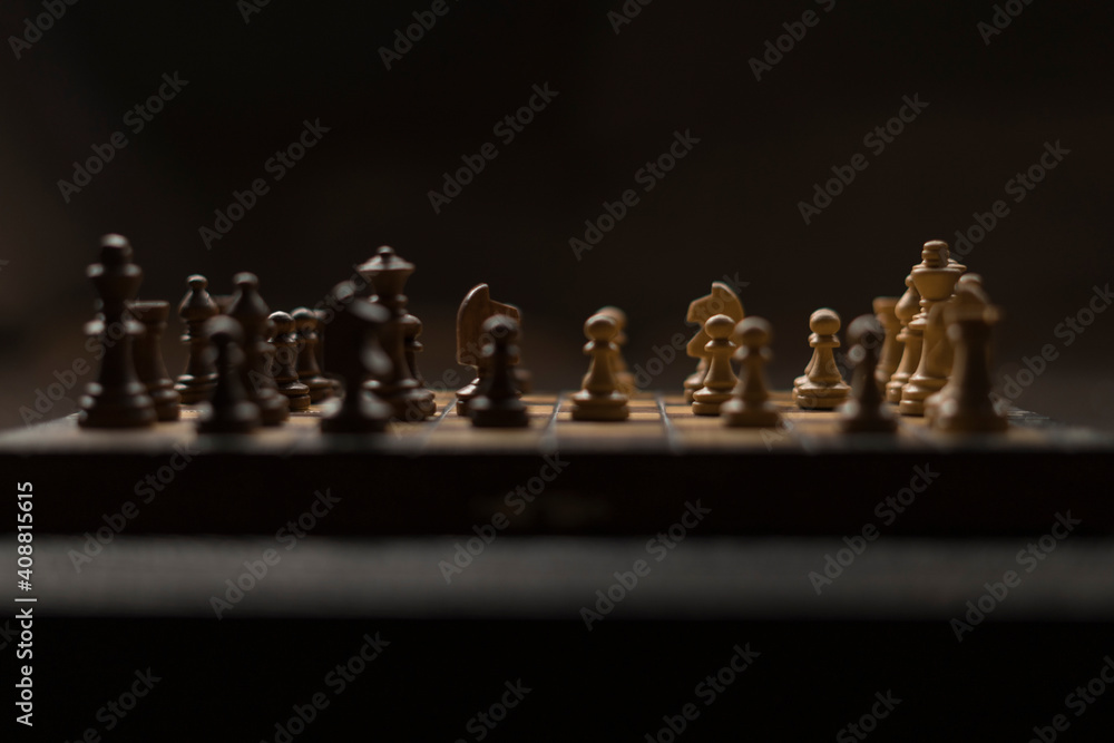 Chess board with checkers, pawns, knights, rooks, bishops, queen and kingblack and white colors Chess board with checkers, pawns, knights, rooks, bishops, queen and kingblack and white colors