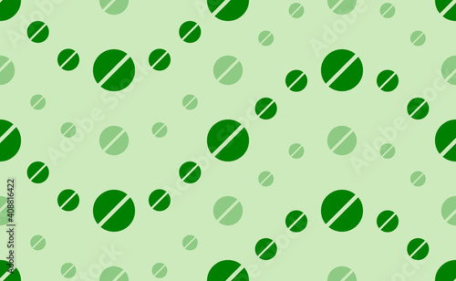 Seamless pattern of large and small green pill symbols. The elements are arranged in a wavy. Vector illustration on light green background