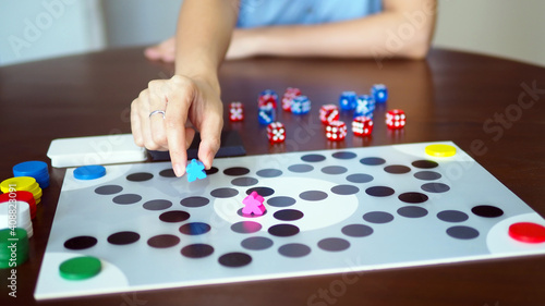 woman people playing fun board game on wooden table top selected focus