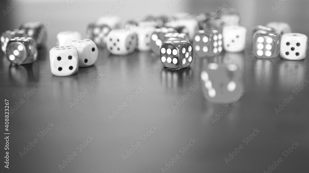 black and white dices game on wooden table top selected focus black and white dices game on wooden table top selected focus