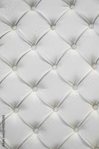 luxury seamless background texture close up white leather material with buttons on furniture