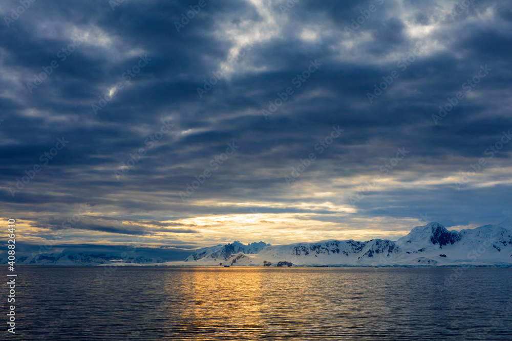 Antarctic sunset over Graham Land and the ocean.