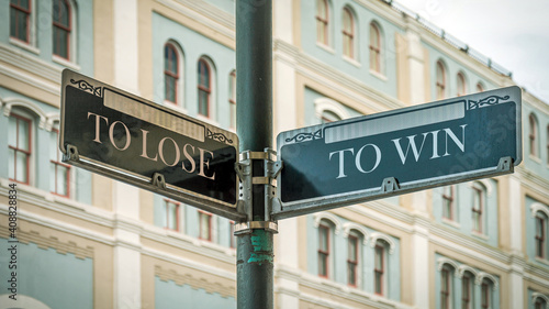Street Sign TO WIN versus TO LOSE © Thomas Reimer
