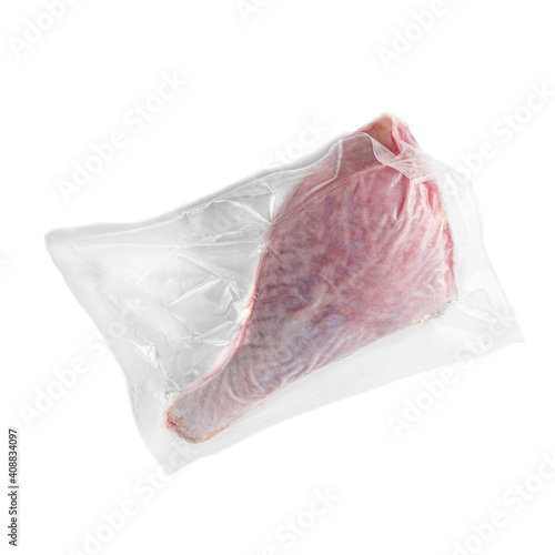 Frozen deer turkey. In plastic vacuum packaging. White background. Isolated. View from above.