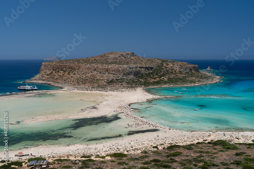 Amazing Panoramic view of Balos Lagoon near Chania, with magical turquoise waters, lagoons, tropical beaches of pure white, pink sand and Gramvousa island on Crete, Cap tigani in the center, 