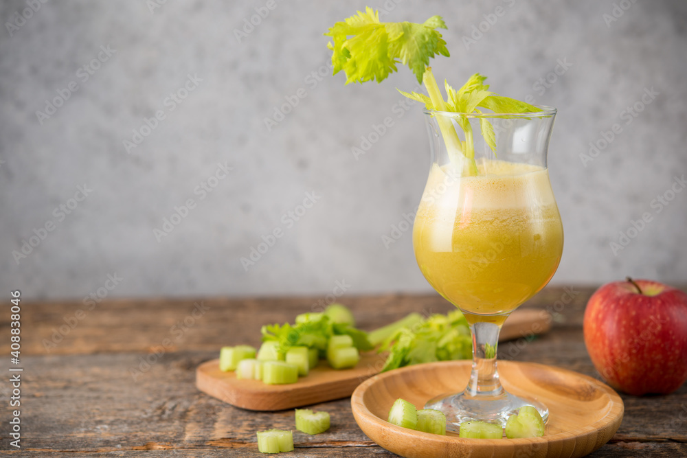 Fototapeta premium Fresh juice apple and celery in a clear glass, vegetarian food, clean food