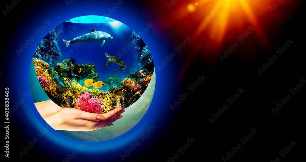 Fototapeta premium Globe in human hand against blue sky.