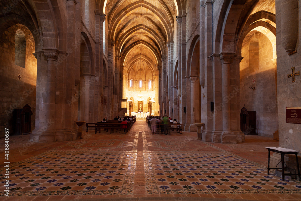 Fototapeta premium Central nave of the Romanesque Gothic style church of the Royal Monastery of Santa Maria de Veruela, in the region of Tarazona y el Moncayo, Aragon, Spain.