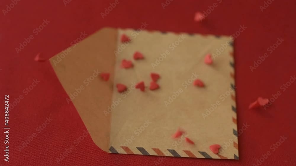 Red heart shaped confetti fall in valentine card Red heart shaped confetti fall in valentine card