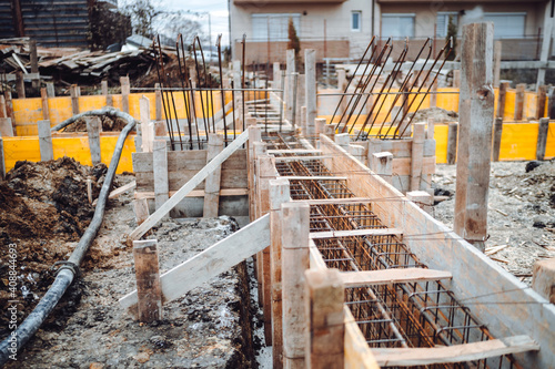 rebar steel bars, reinforcement concrete bars with wire rod used in foundation of construction site. photo