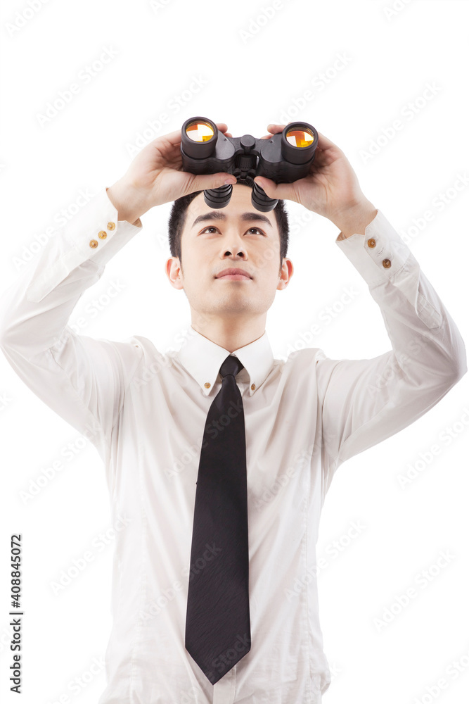 Business people using telescope Business people using telescope