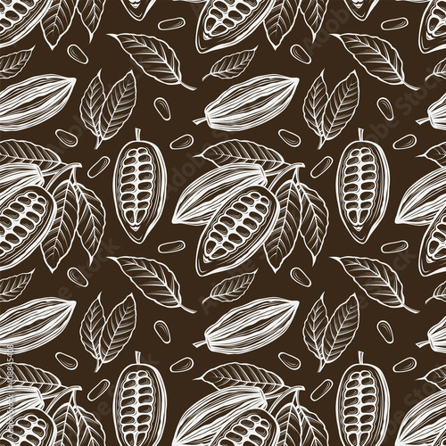 seamless pattern of cocoa beans, branch and leaves on brown background