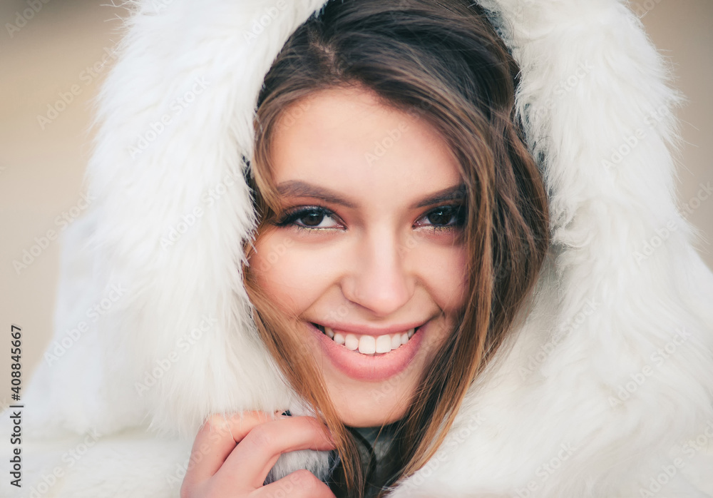 Beautiful young woman with white teeth and a perfect smile. Happy sincere outdoor portrait of attractive model Beautiful young woman with white teeth and a perfect smile. Happy sincere outdoor portrait of attractive model