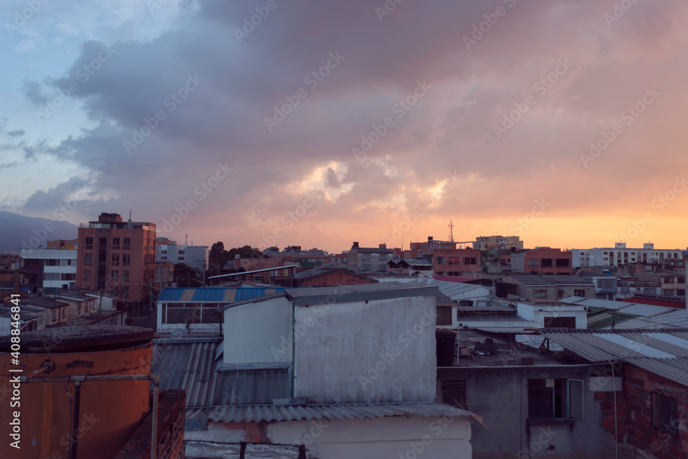 Beautiful colored dusk in bogota, colombia from a industrial and residential neighborhood. Beautiful colored dusk in bogota, colombia from a industrial and residential neighborhood.