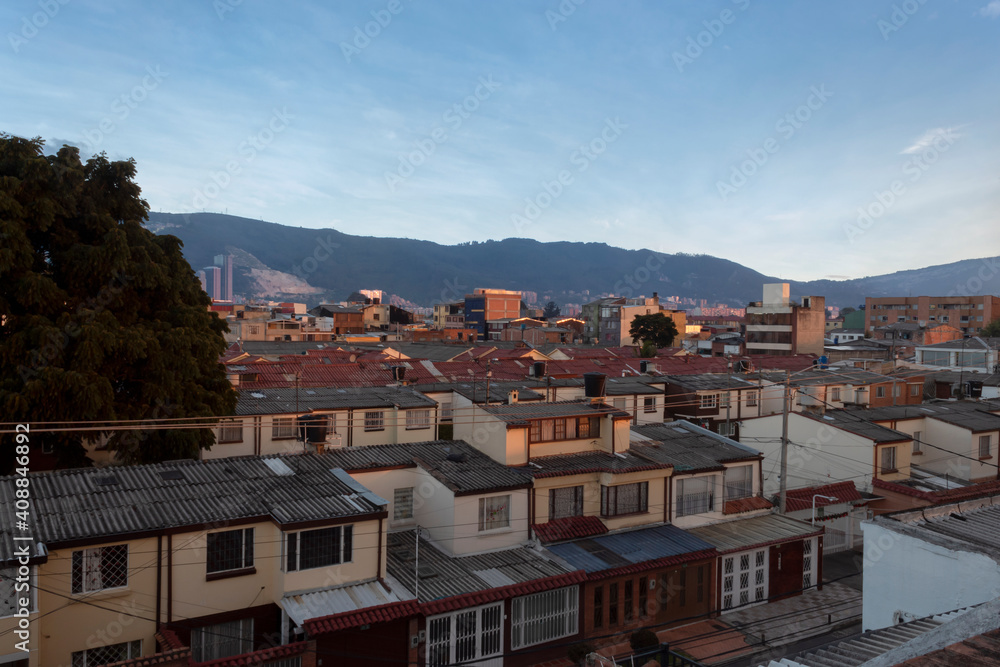 Typically blue summer sunset view of a Latin American metropoli neighborhood  