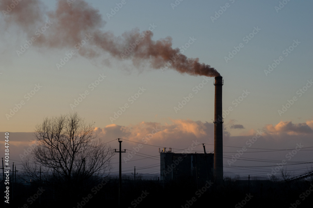 Furnace and smoke. Small thermal power plant that works by burning coal Furnace and smoke. Small thermal power plant that works by burning coal
