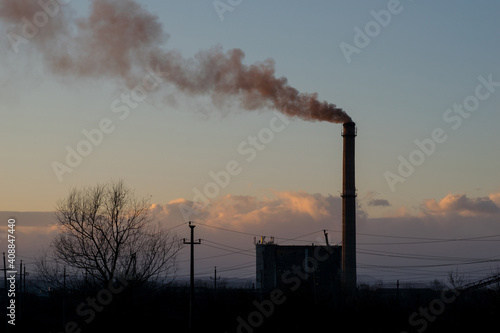 Furnace and smoke. Small thermal power plant that works by burning coal