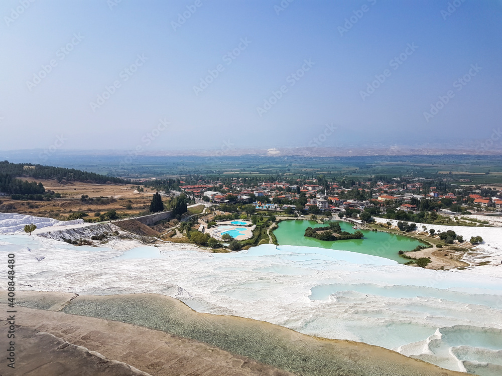 It is the old city of Hierapolis. Pamukkale is on the UNESCO World Heritage List. Carbonate minerals from the city spas and flowing waters cover terraces and travertines.
