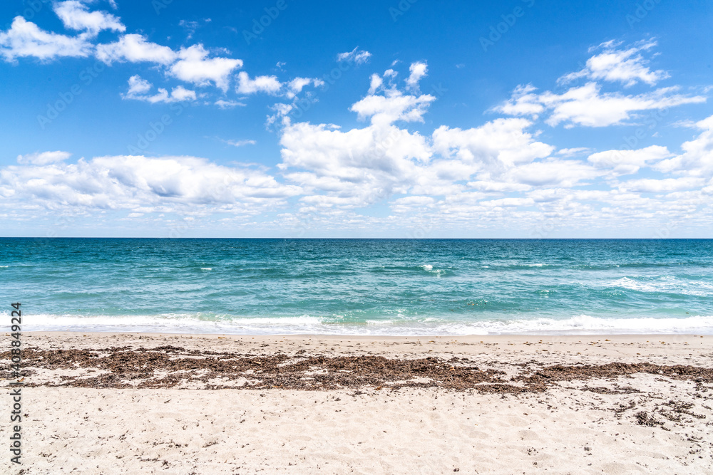 Fototapeta premium Beach with blue water