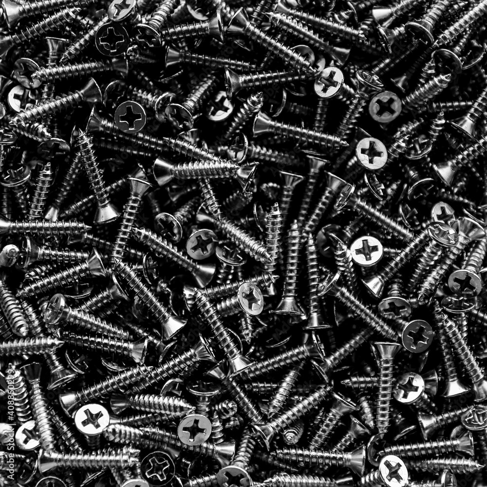 Closeup of steel screws background Closeup of steel screws background