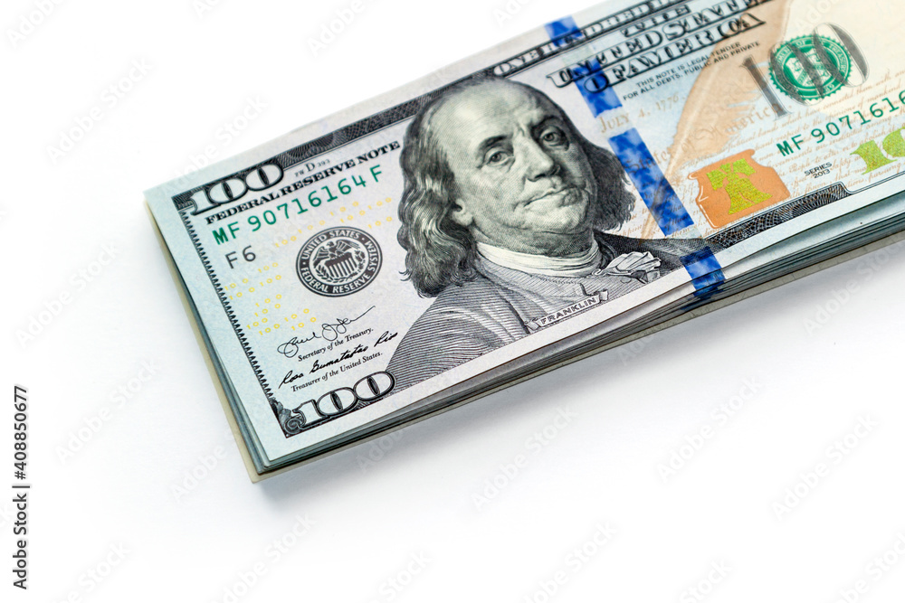 Stack of new design one hundred US Dollar bills isolated on white background Stack of new design one hundred US Dollar bills isolated on white background