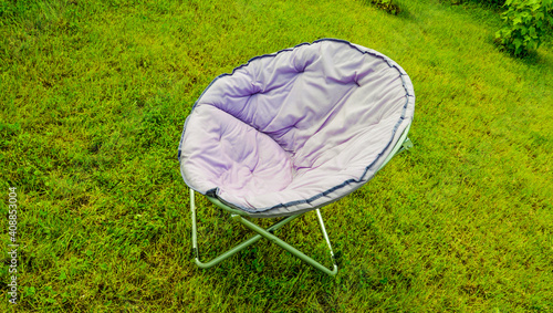 Konstfotografi Country lilac chair in the sun on the lawn