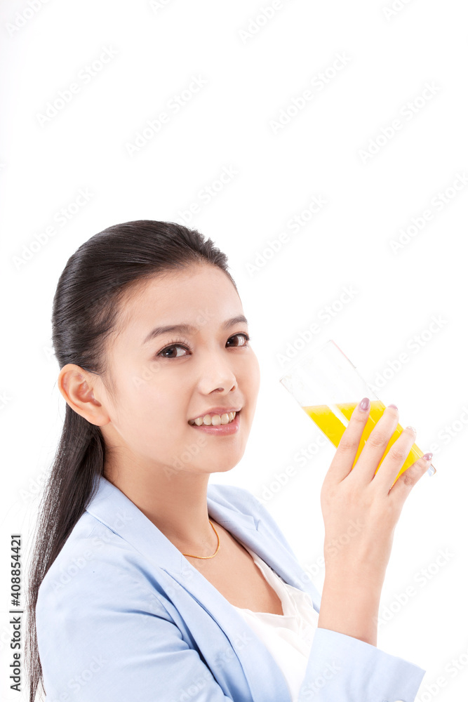 Oriental fashion woman drinking orange juice Oriental fashion woman drinking orange juice