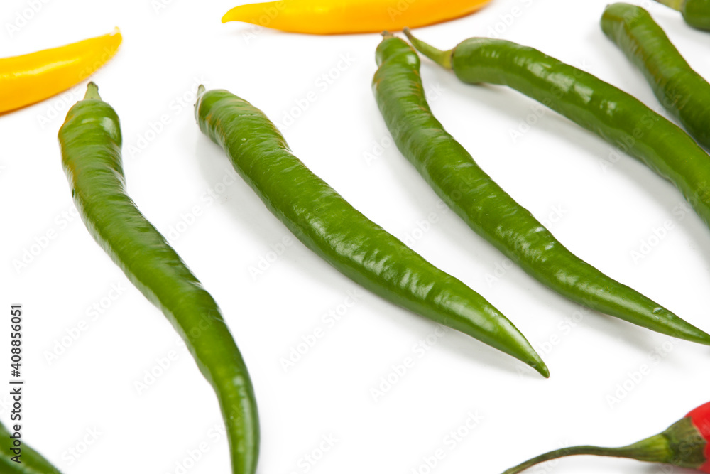 Small peppers isolated on a white background. View from another angle in the portfolio. Small peppers isolated on a white background. View from another angle in the portfolio.