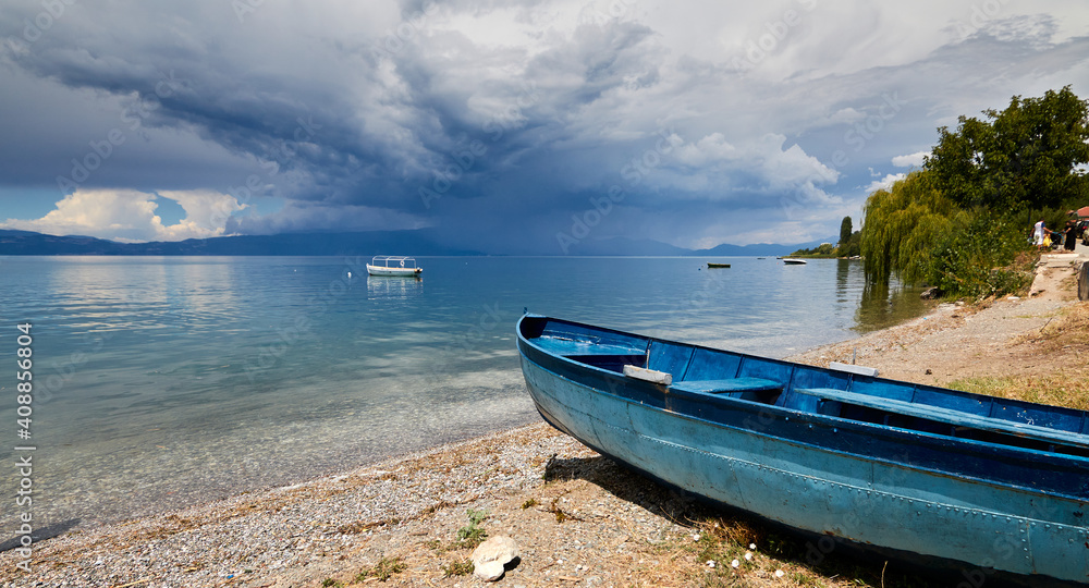 Boat next to Lake Ohrid, Macedonia, with the storm in the background