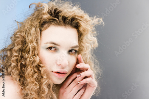 Portrait of a girl with curls photo