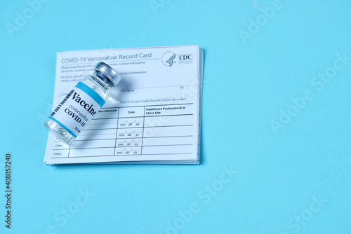 Immune passport or certificate for travel concept. 2019-ncov Covid-19 Corona Virus drug vaccine vial medicine bottles syringe injection. SARS-CoV-2 Vaccination, immunization.